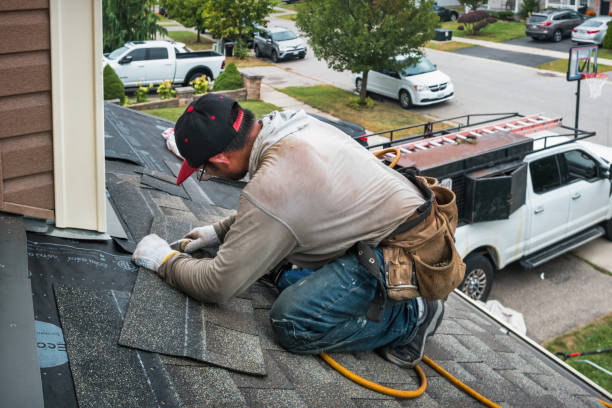 Professional Flat Roof Repair technician working in Houston, TX